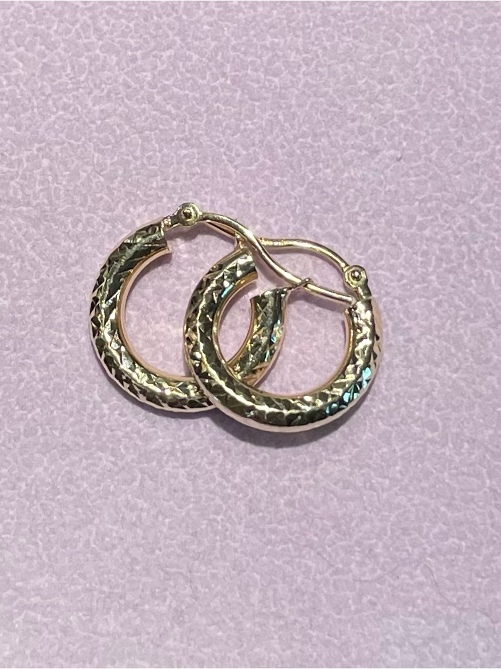 14k Solid Yellow Gold Diamond
Cut Textured Round Hoop Earrings
Marked - Picture 8 of 14